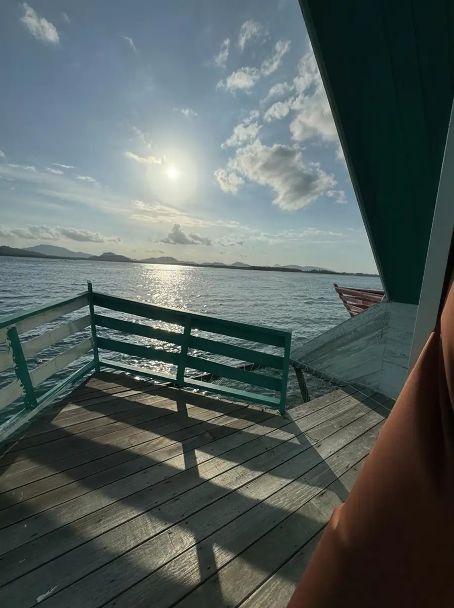 Private sunlit terrace at Adil Waterhouse Resort, an intimate over the water escape in Semporna bridging luxury design with the raw beauty of the ocean. A perfect romantic perch to enjoy the ocean breeze.