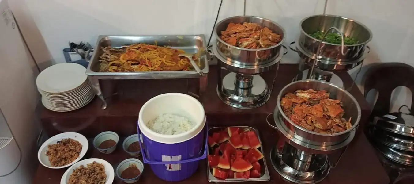 Resort buffet table with various local and international dishes Adil Waterhouse Resort