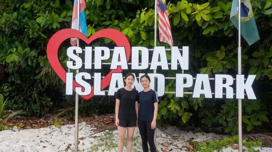 A beautiful scenic view of Sipadan Island with Adil Waterhouse Resort in the Celebes Sea area of the Semporna area.